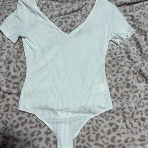 Grey body suit thong